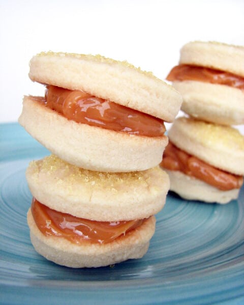 Alfajores de Dulce de Leche stacked on a plate