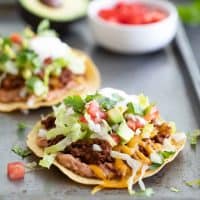 ground beef tostada with toppings