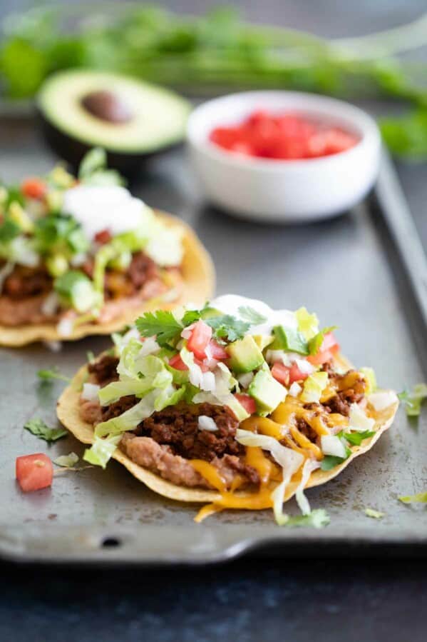 ground beef tostada with toppings