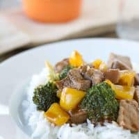 Hoisin Beef with Vegetables over rice on a plate