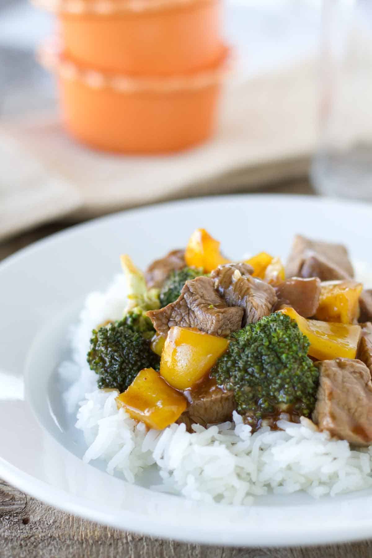 Hoisin Beef with Vegetables over rice on a plate