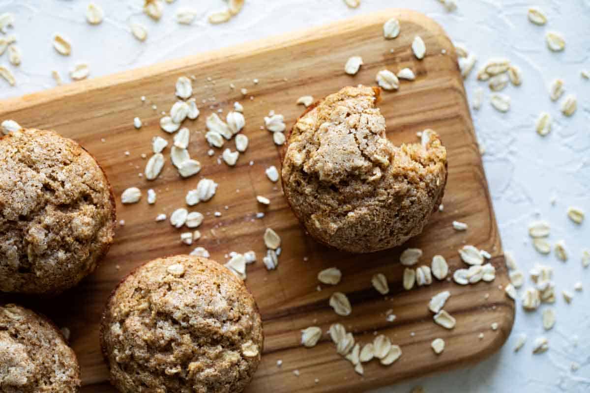 tops of oatmeal muffins with oats sprinkled