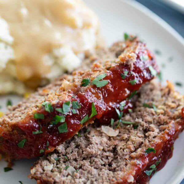 sliced meatloaf with mashed potatoes
