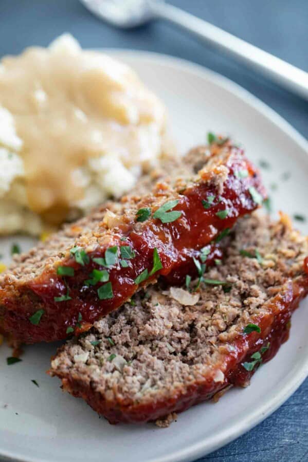 sliced meatloaf with mashed potatoes