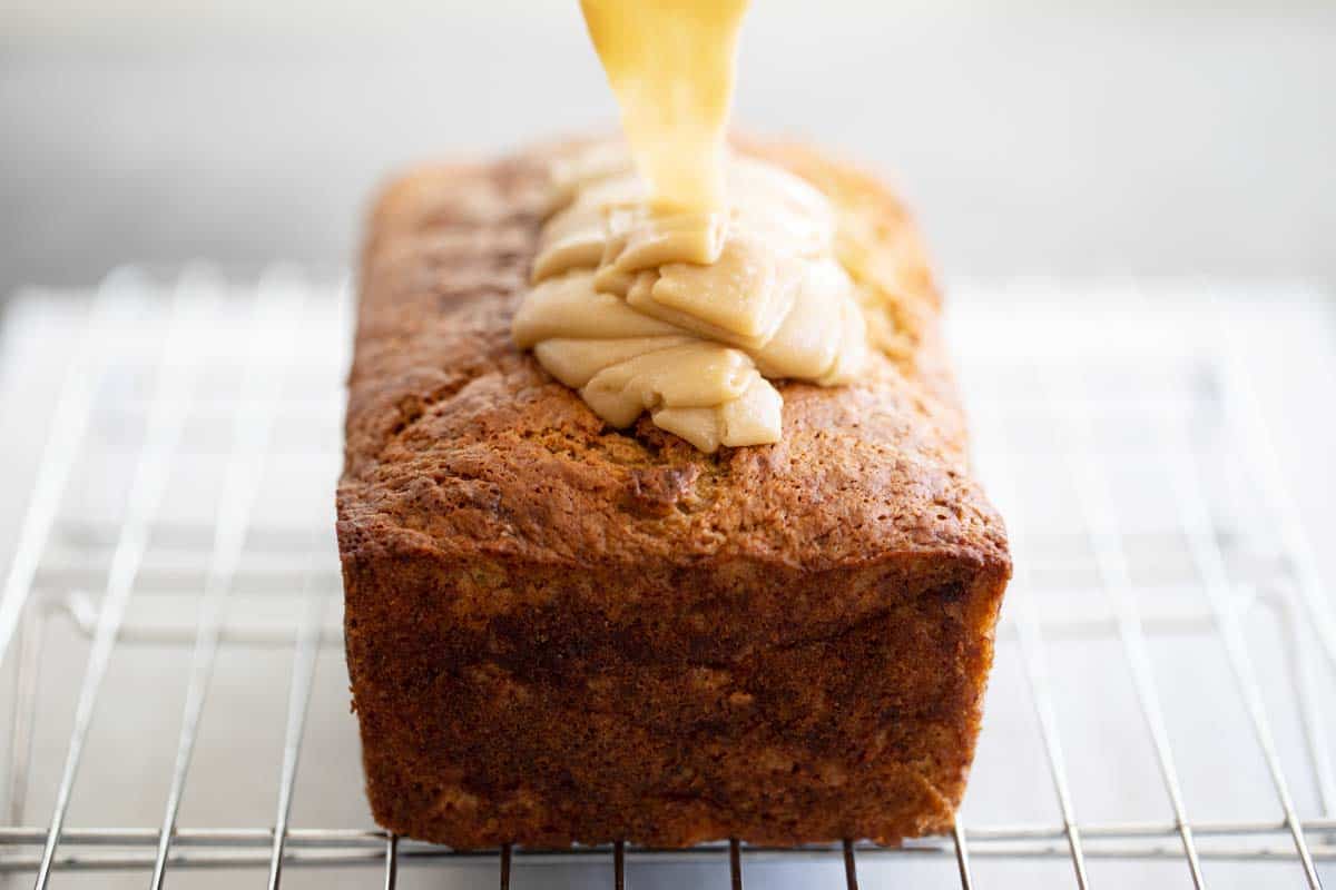 Caramel icing poured on banana bread