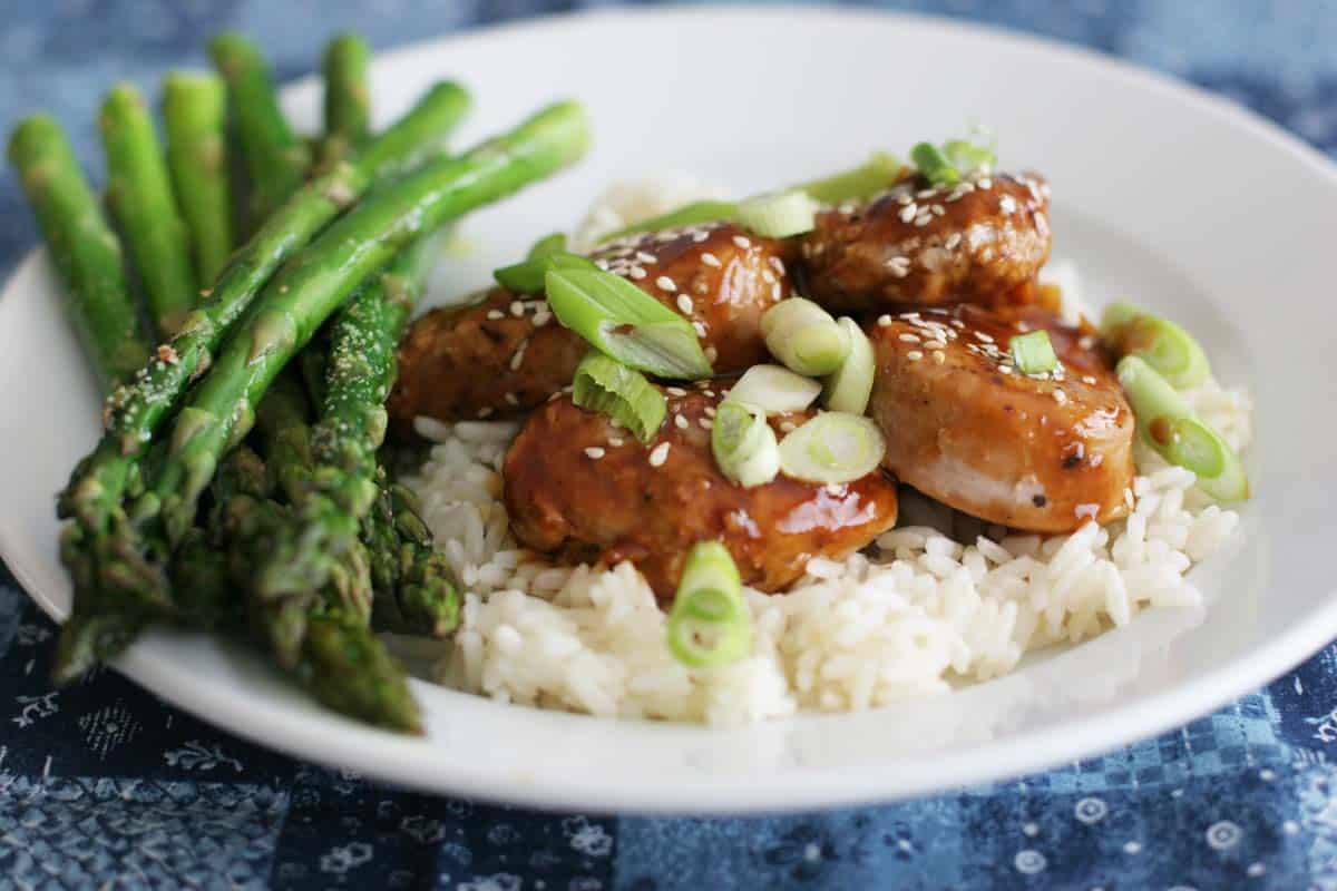 Easy Pork with Hoisin Sauce on rice with asparagus