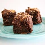 Brownies with chocolate and toffee on a plate