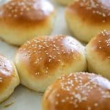 homemade hamburger buns topped with sesame seeds