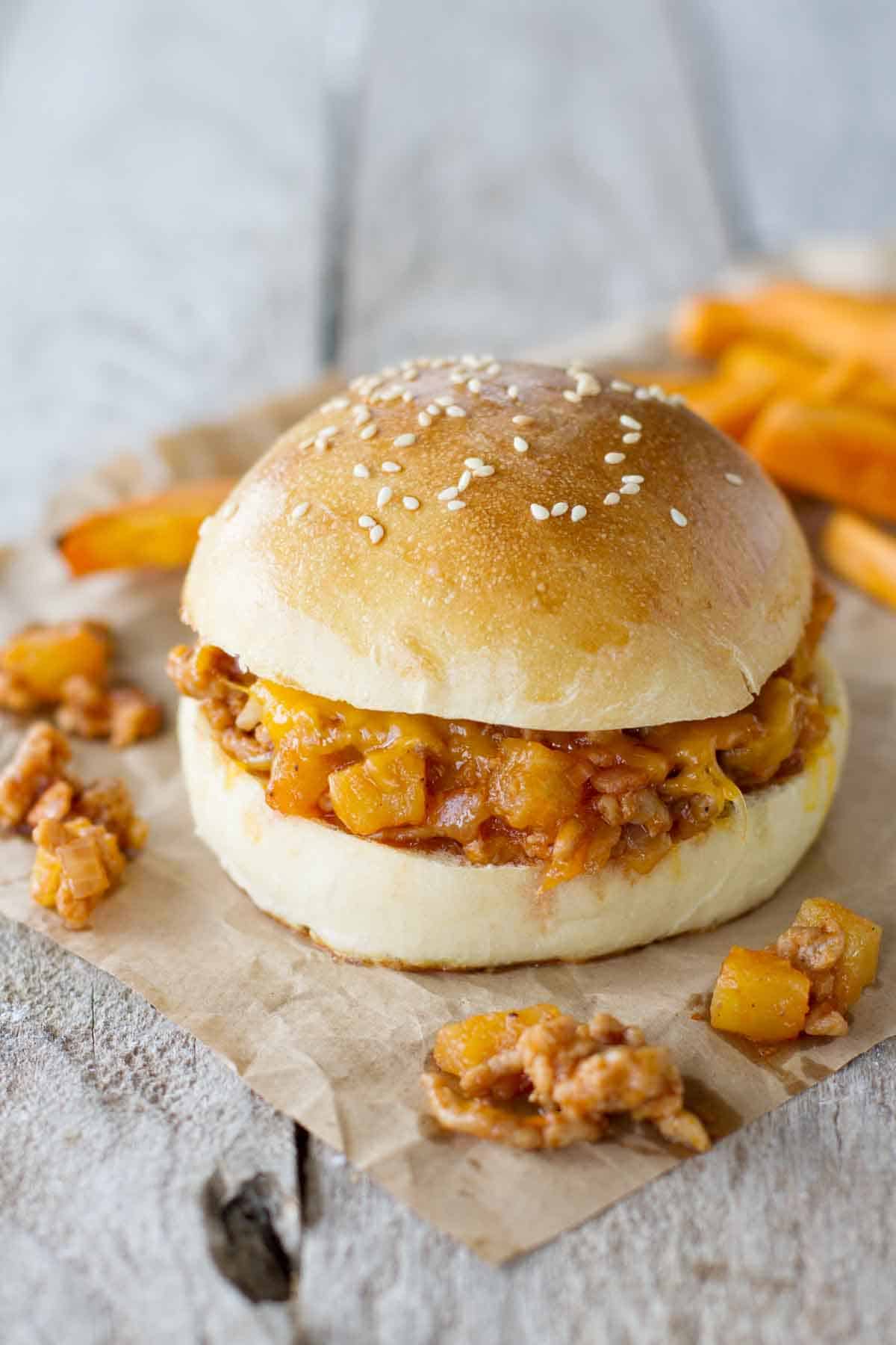 Hawaiian sloppy joes with filling falling out.