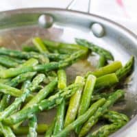 Maple Mustard Sauteed Asparagus in a skillet