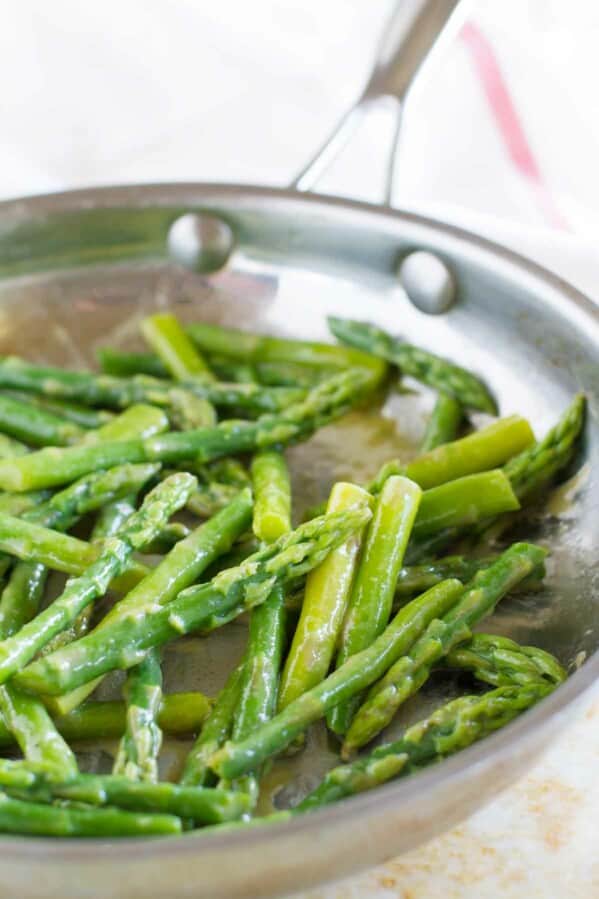 Maple Mustard Sauteed Asparagus in a skillet