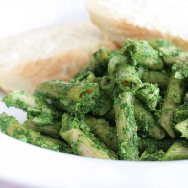dish of pasta covered in spinach pesto
