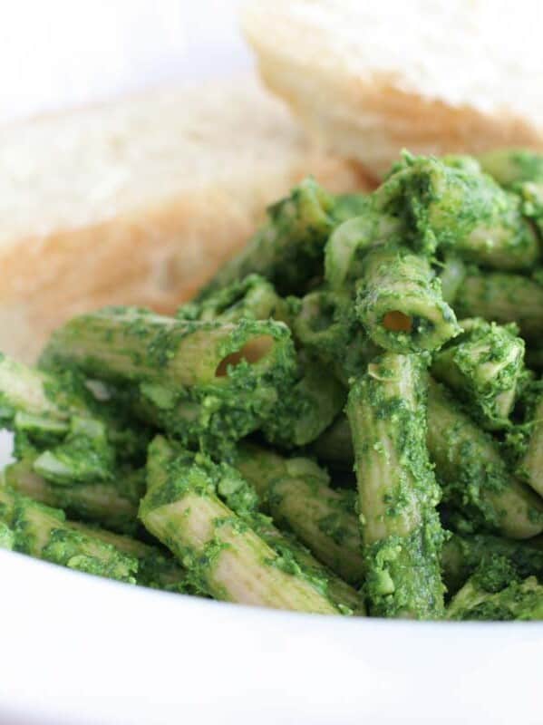 dish of pasta covered in spinach pesto