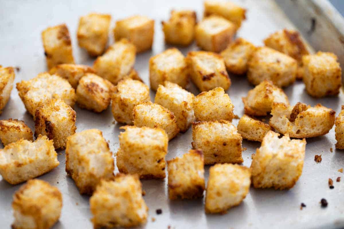 homemade croutons on a baking sheet