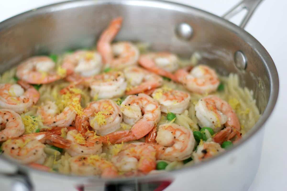 Shrimp and orzo in a skillet