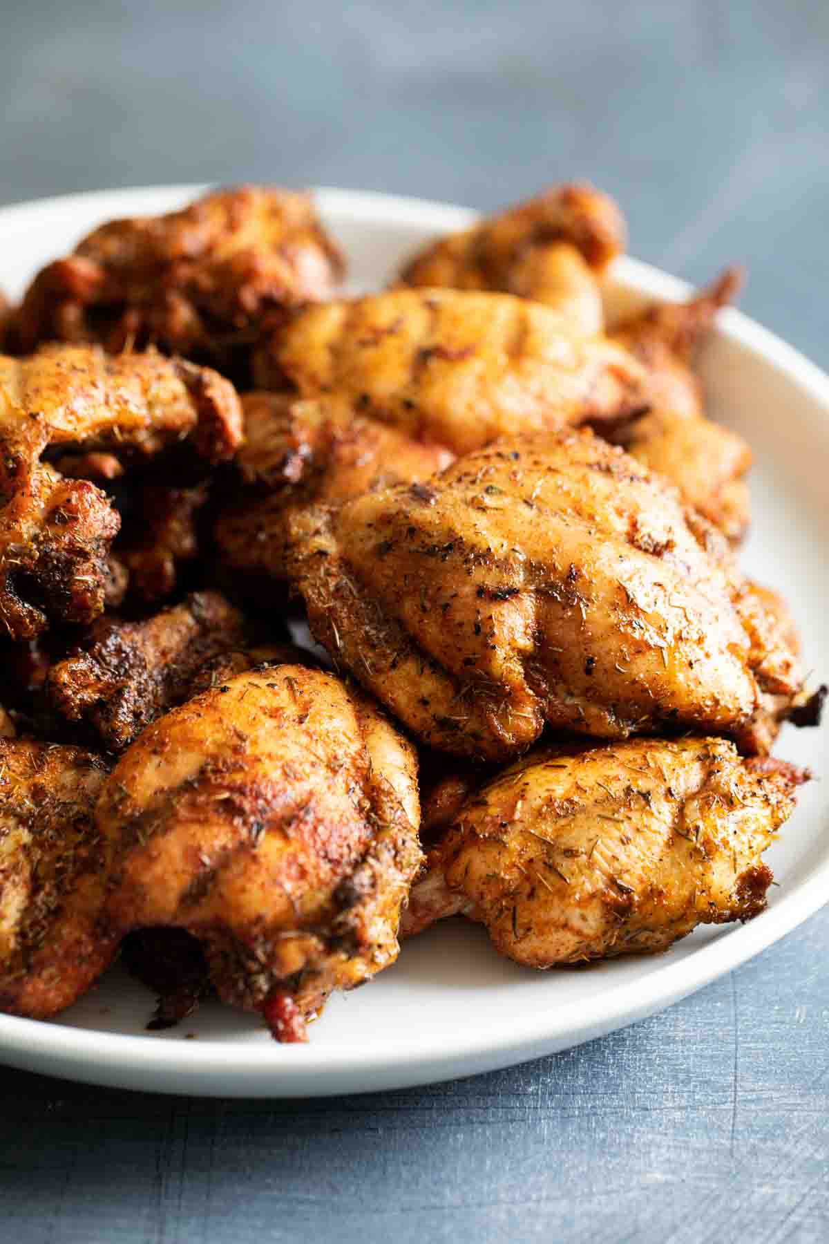 plate of cooked chicken thighs