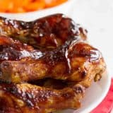 plate with hoisin glazed chicken drumsticks