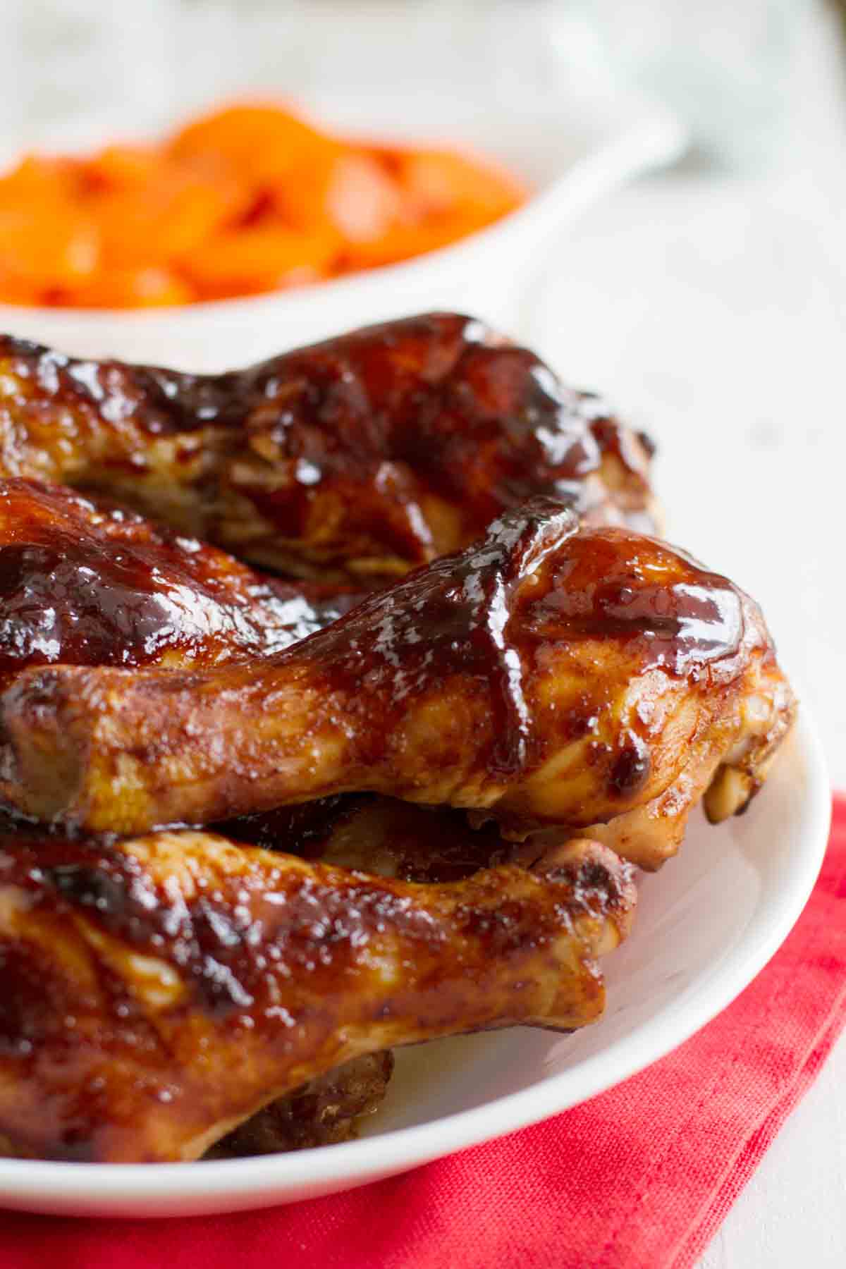 plate with hoisin glazed chicken drumsticks