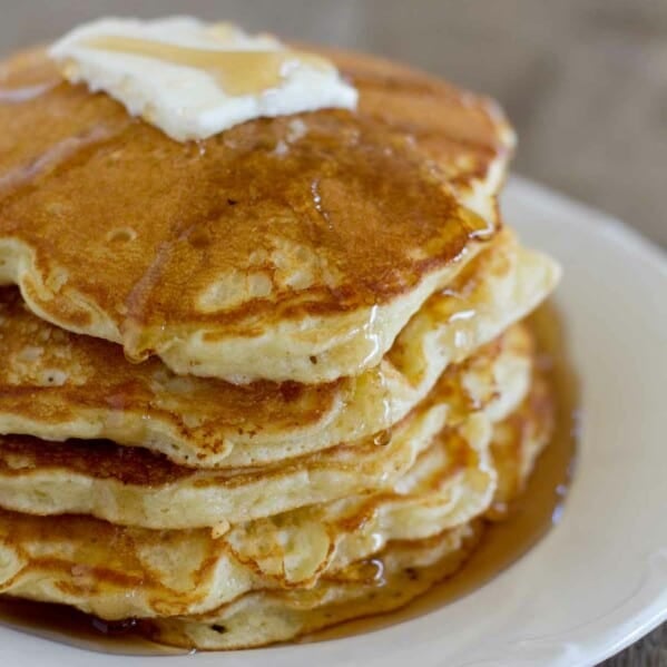 stack fo corn cake pancakes with syrup