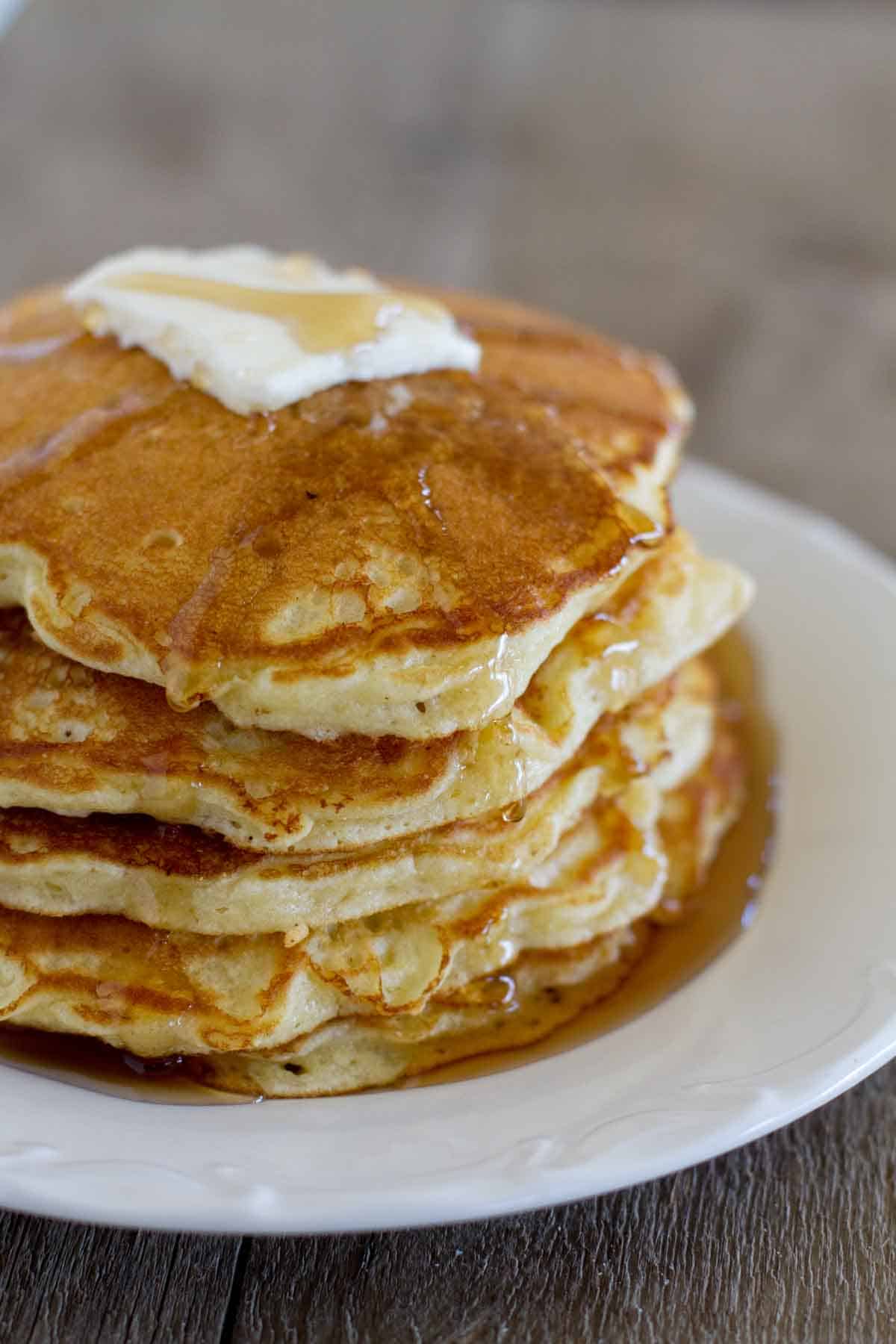 stack fo corn cake pancakes with syrup