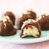 Ice Cream Bonbons - cookies topped with ice cream and covered in chocolate on a plate