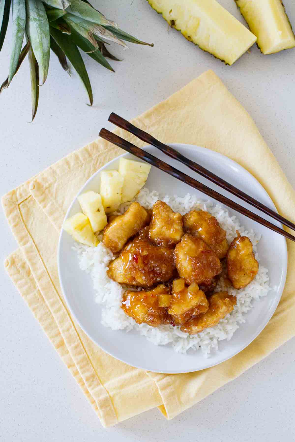 overhead view of pineapple chicken over rice