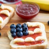 Slice of toast with toppings to look like the American flag