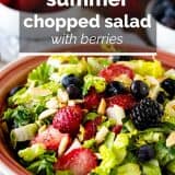 Chopped salad with berries and nuts with text overlay