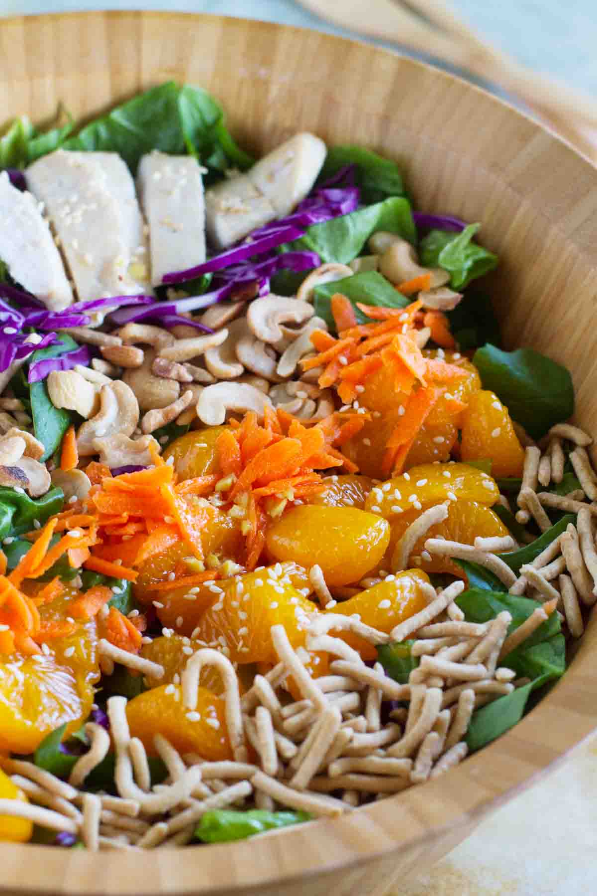 Asian Chicken Salad in a wooden bowl