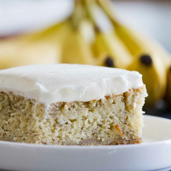 close up of banana cake with cream cheese frosting