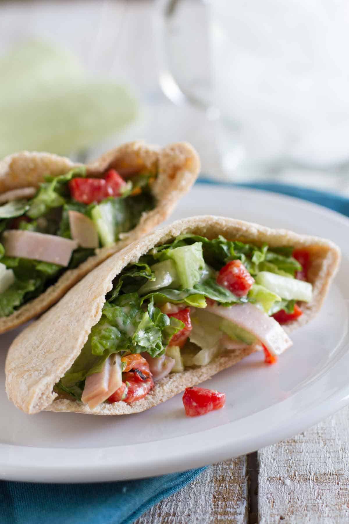 pita sandwich with turkey, lettuce and roasted red peppers