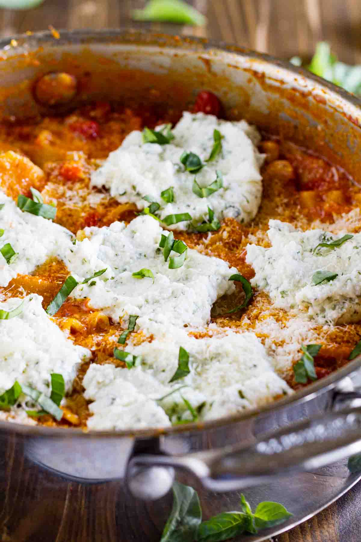pan with Skillet Lasagna topped with ricotta and basil