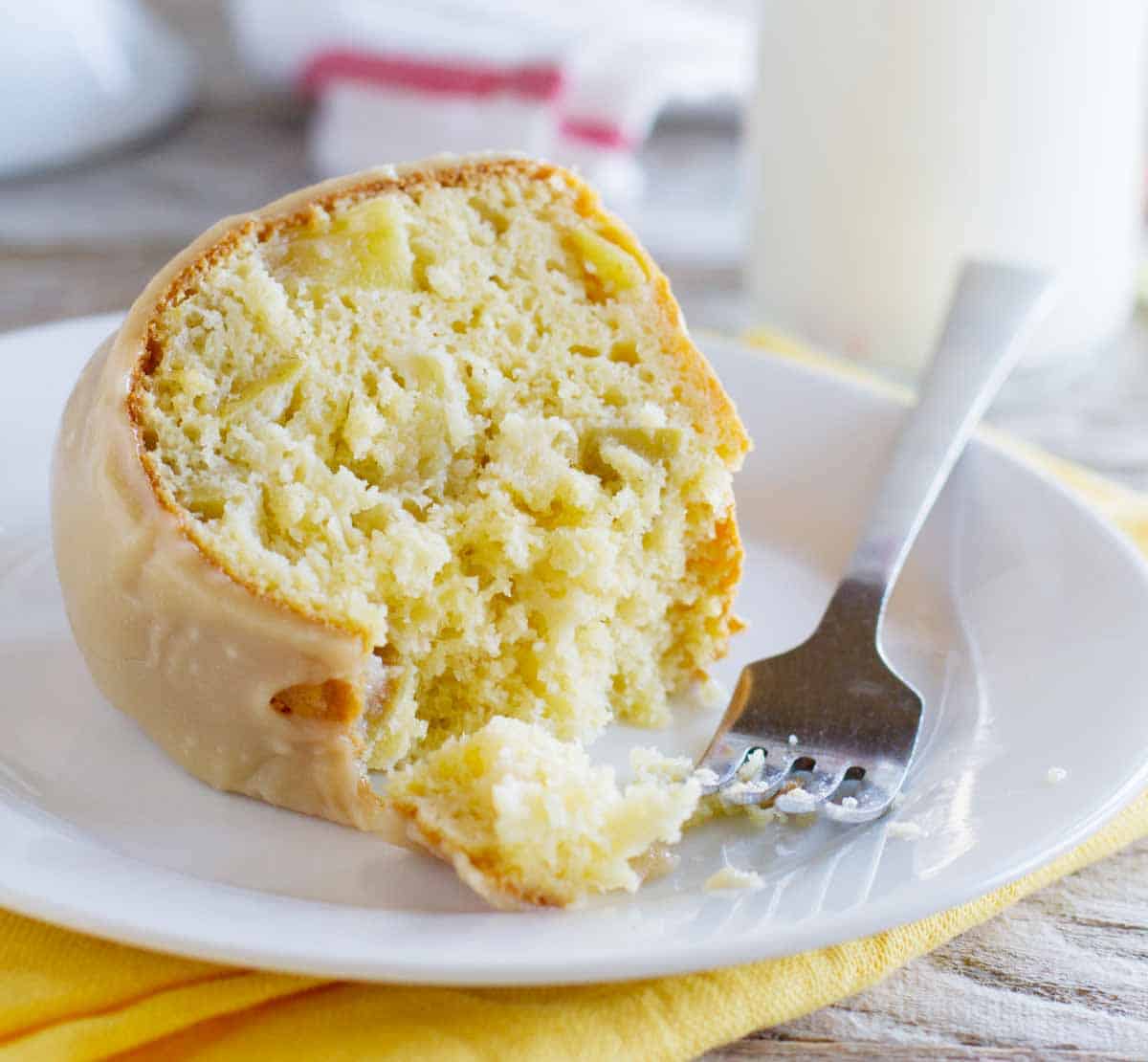 slice of apple bundt cake with a fork