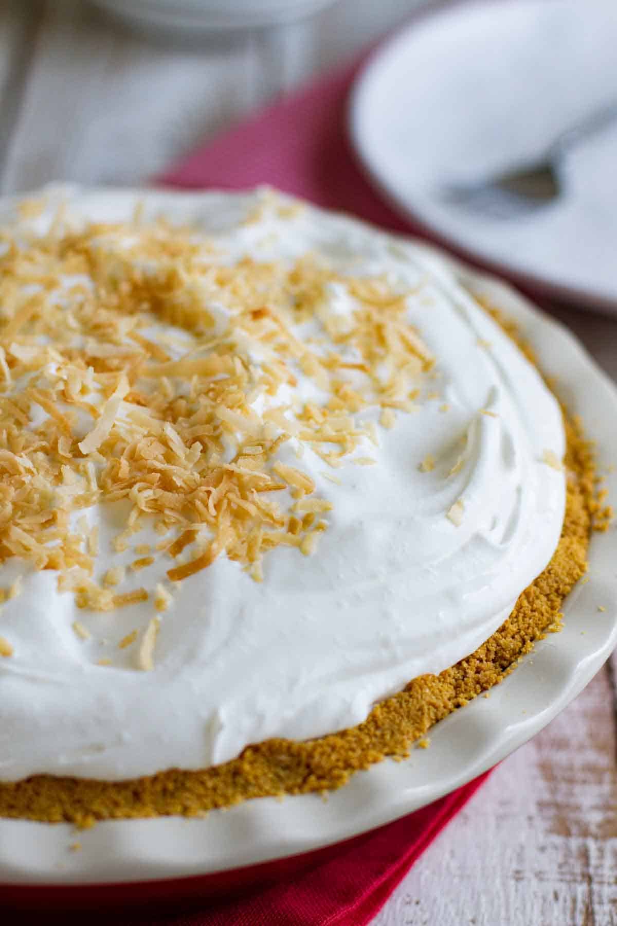 whole coconut cream pie with a cookie crust