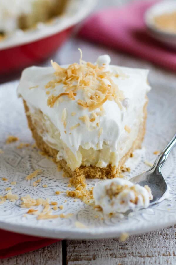 fork with bite of coconut cream pie