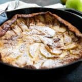 German Apple Pancake in a cast iron pan