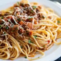 plate of Instant Pot Bolognese with spaghetti noodles