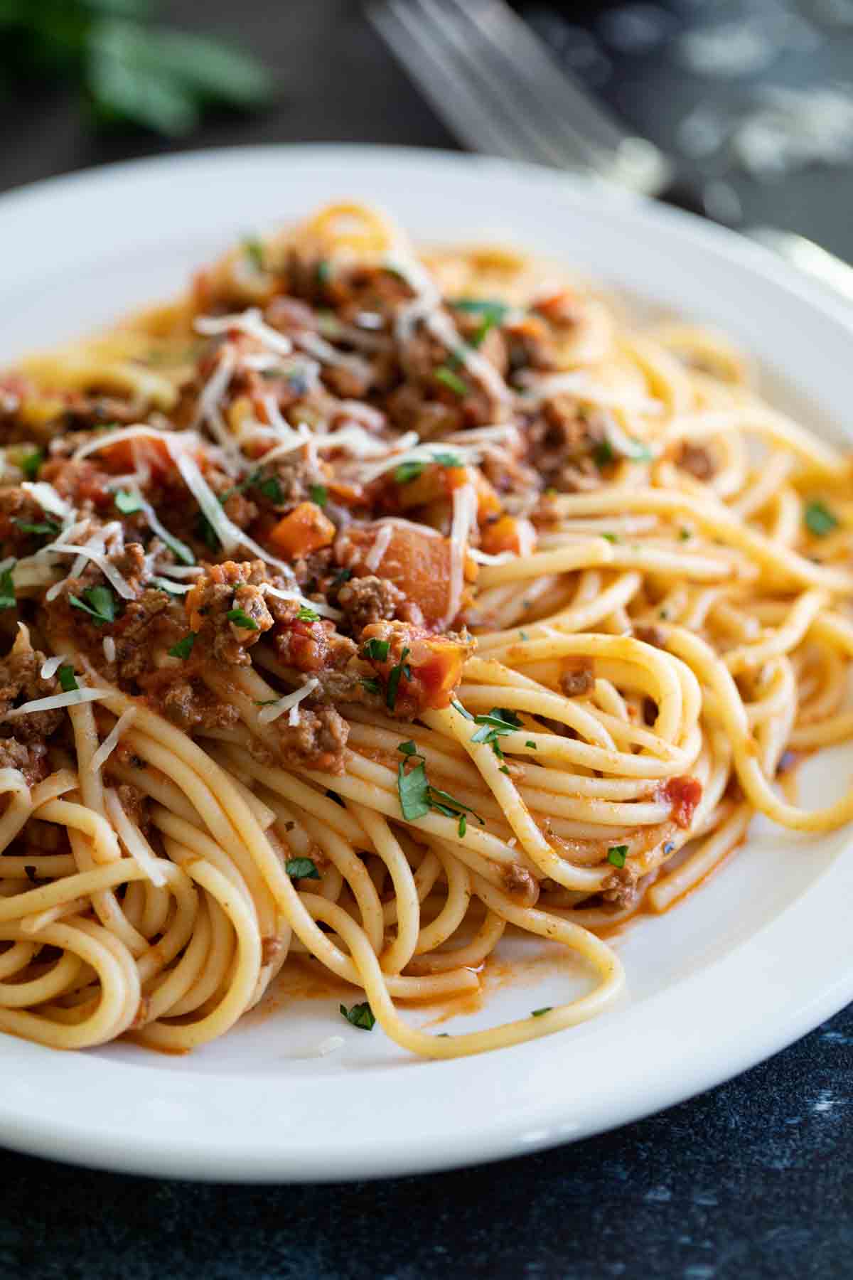 plate of Instant Pot Bolognese with spaghetti noodles