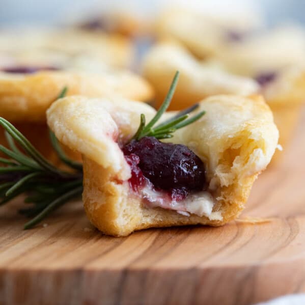 cranberry brie bites with bite taken from it
