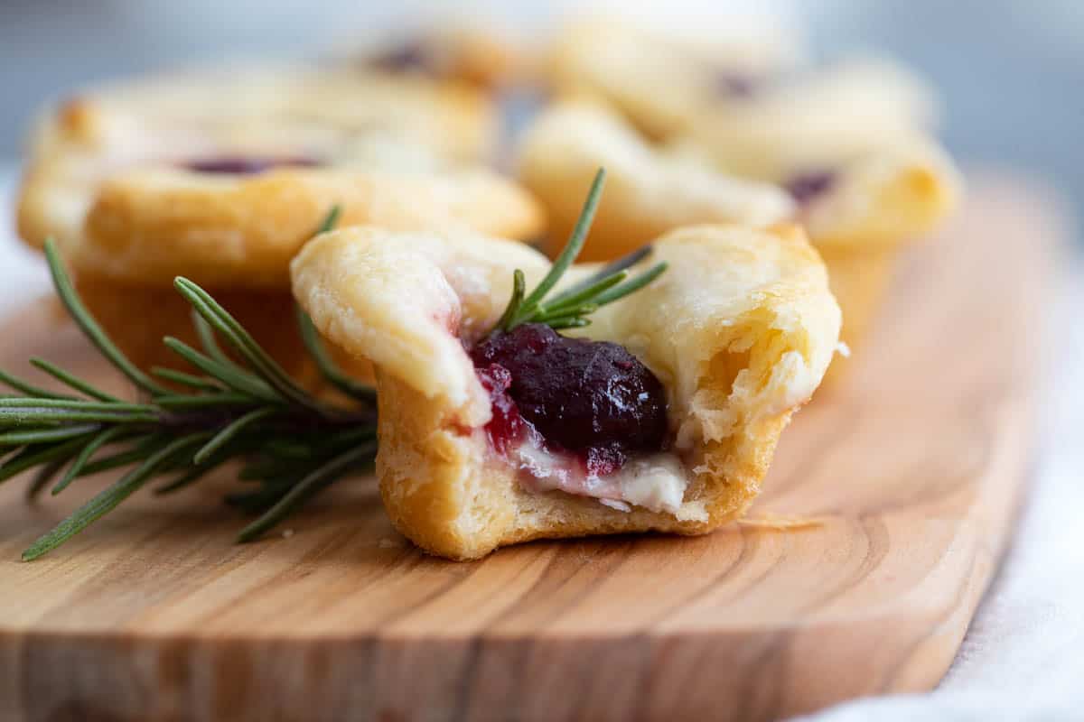 cranberry brie bites with bite taken from it