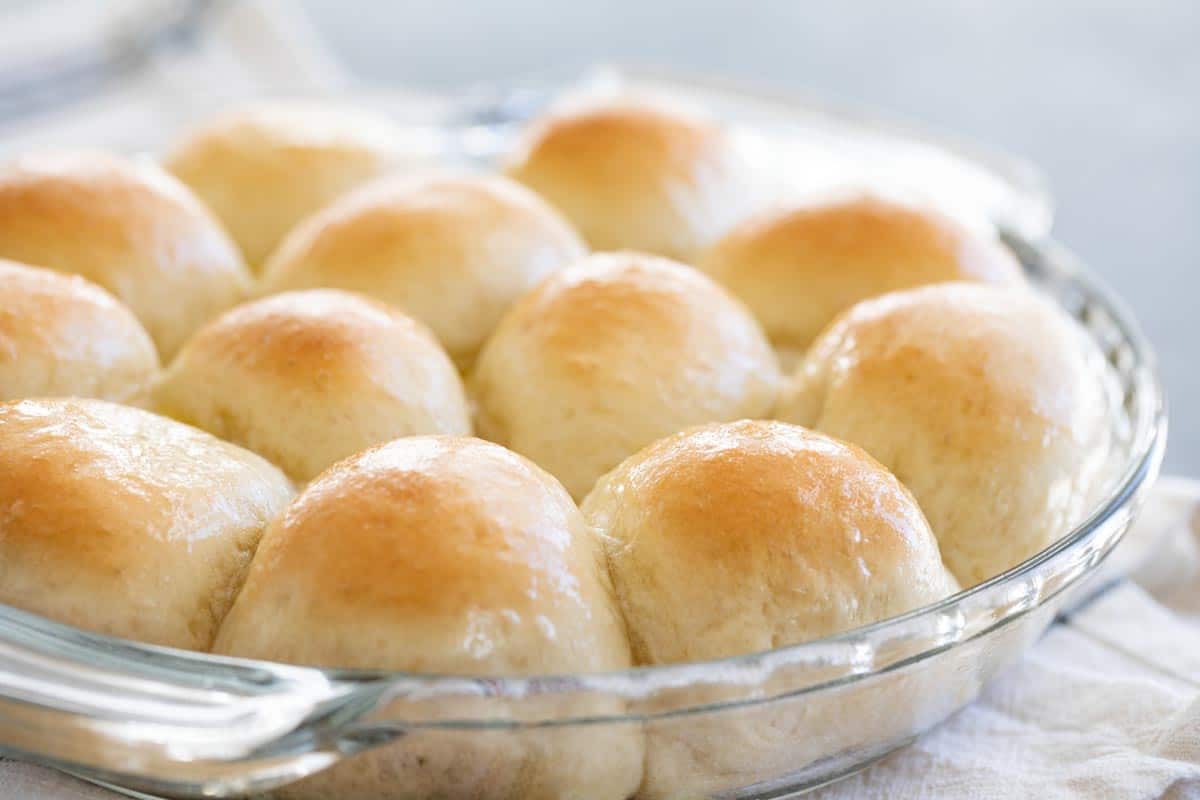 Dish of freshly baked dinner rolls.