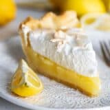 slice of lemon meringue pie on a plate