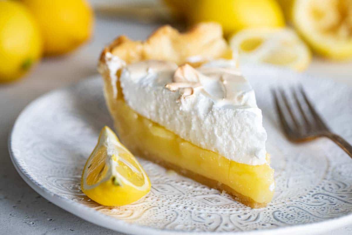 slice of lemon meringue pie on a plate