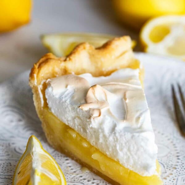 slice of lemon meringue pie on a plate