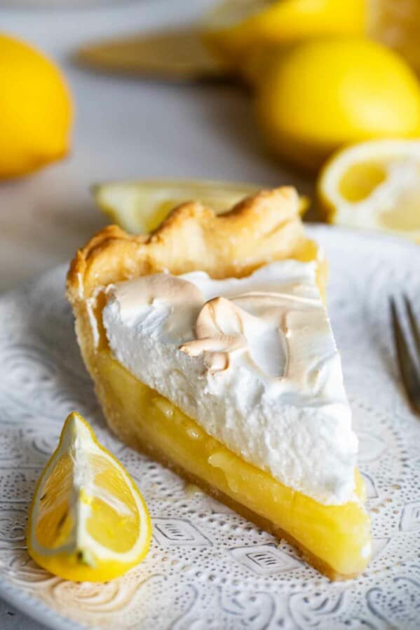 slice of lemon meringue pie on a plate