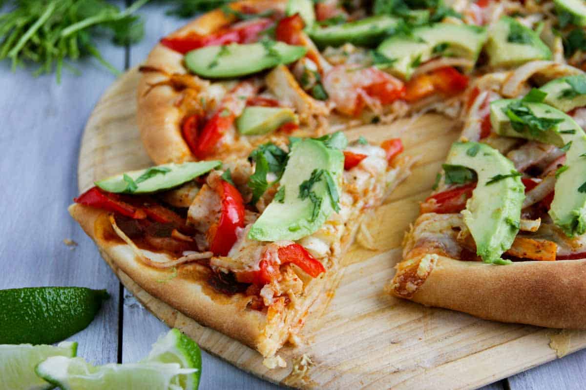 slice of Turkey Fajita Pizza on a pizza peel