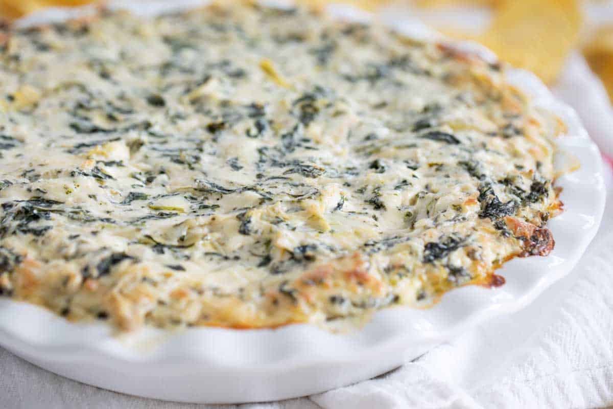 dish with spinach artichoke dip