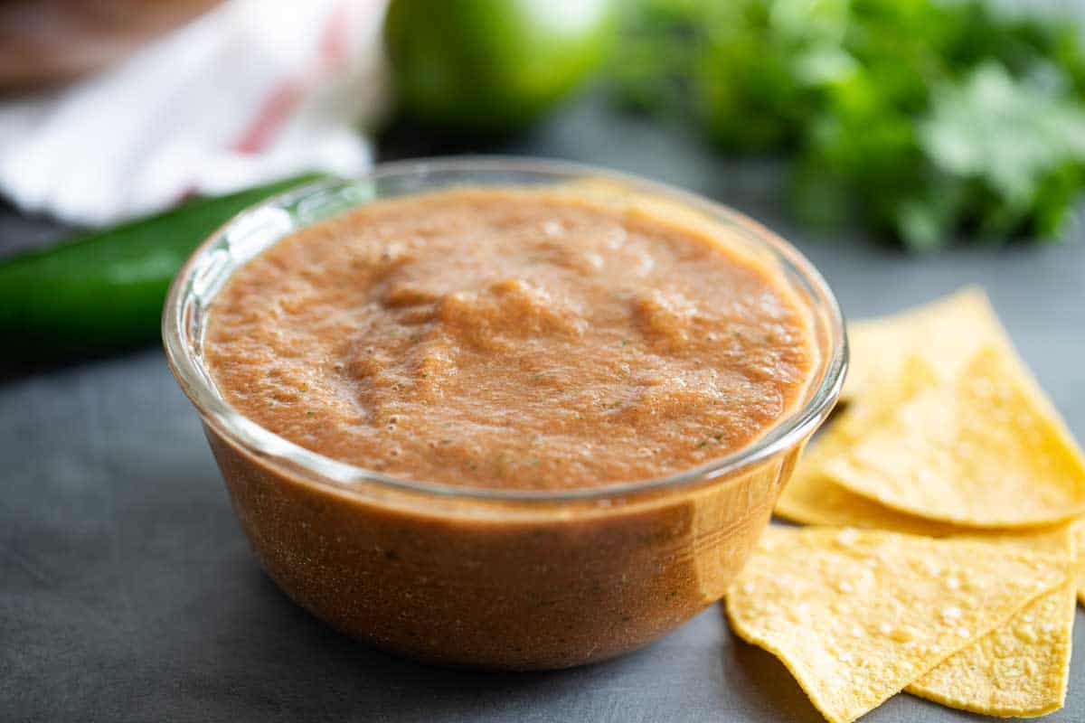 bowl of Homemade Salsa with chips on the side