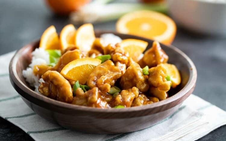 bowl with rice and orange chicken