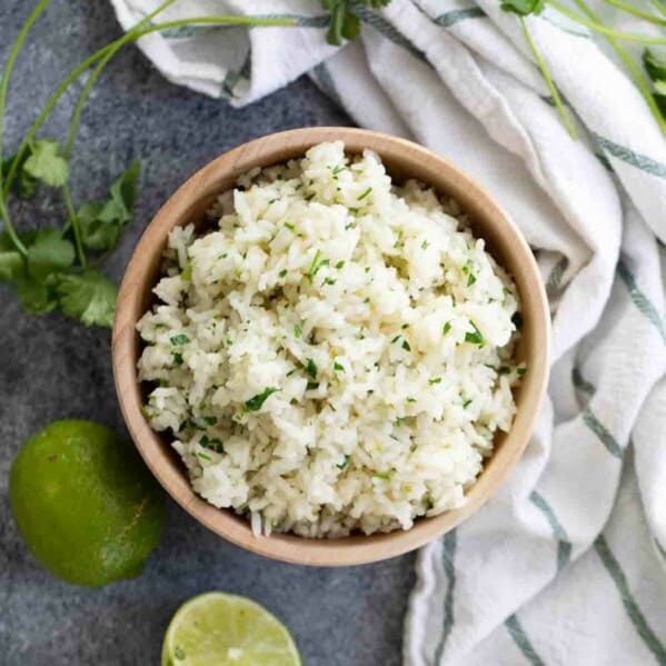overhead view of wooden bowl with cilantro lime rice